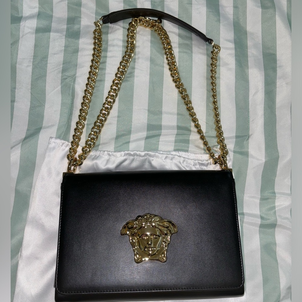 This is an amazing Versace inspired bag price states the obvious no questions